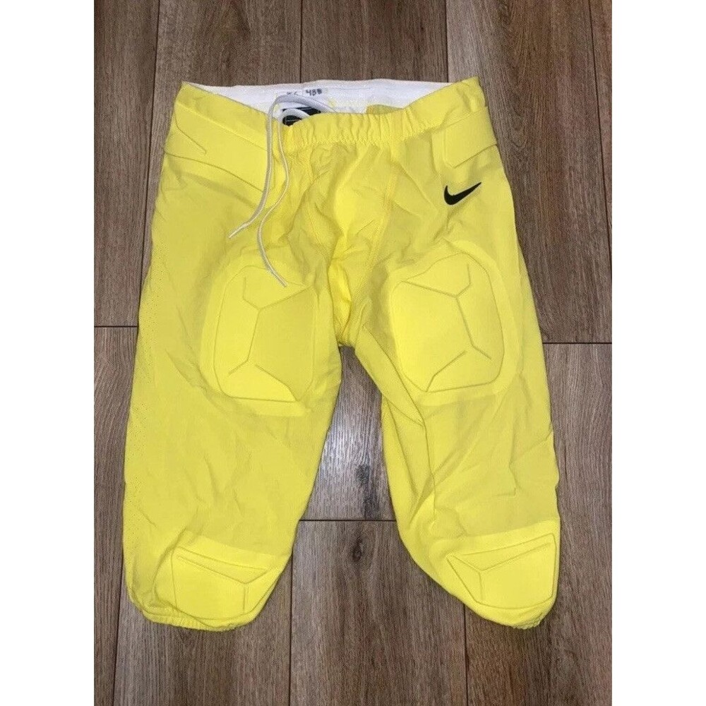 RARE men's OREGON DUCKS game used Nike football pants | 30 | lightning yellow